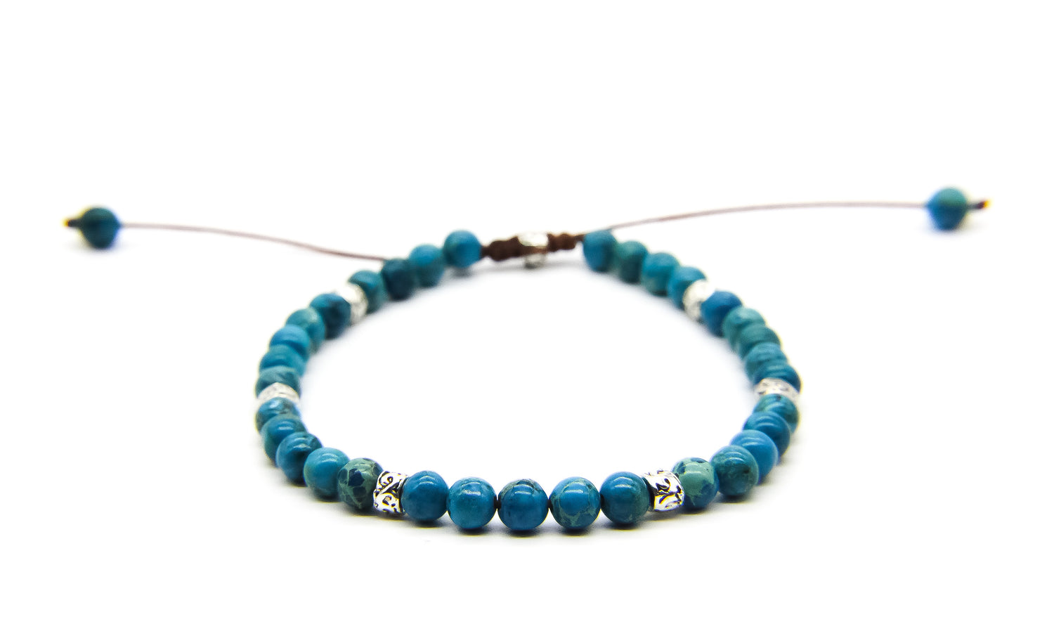 Beaded Bracelet with blue and silver beads on a white background 