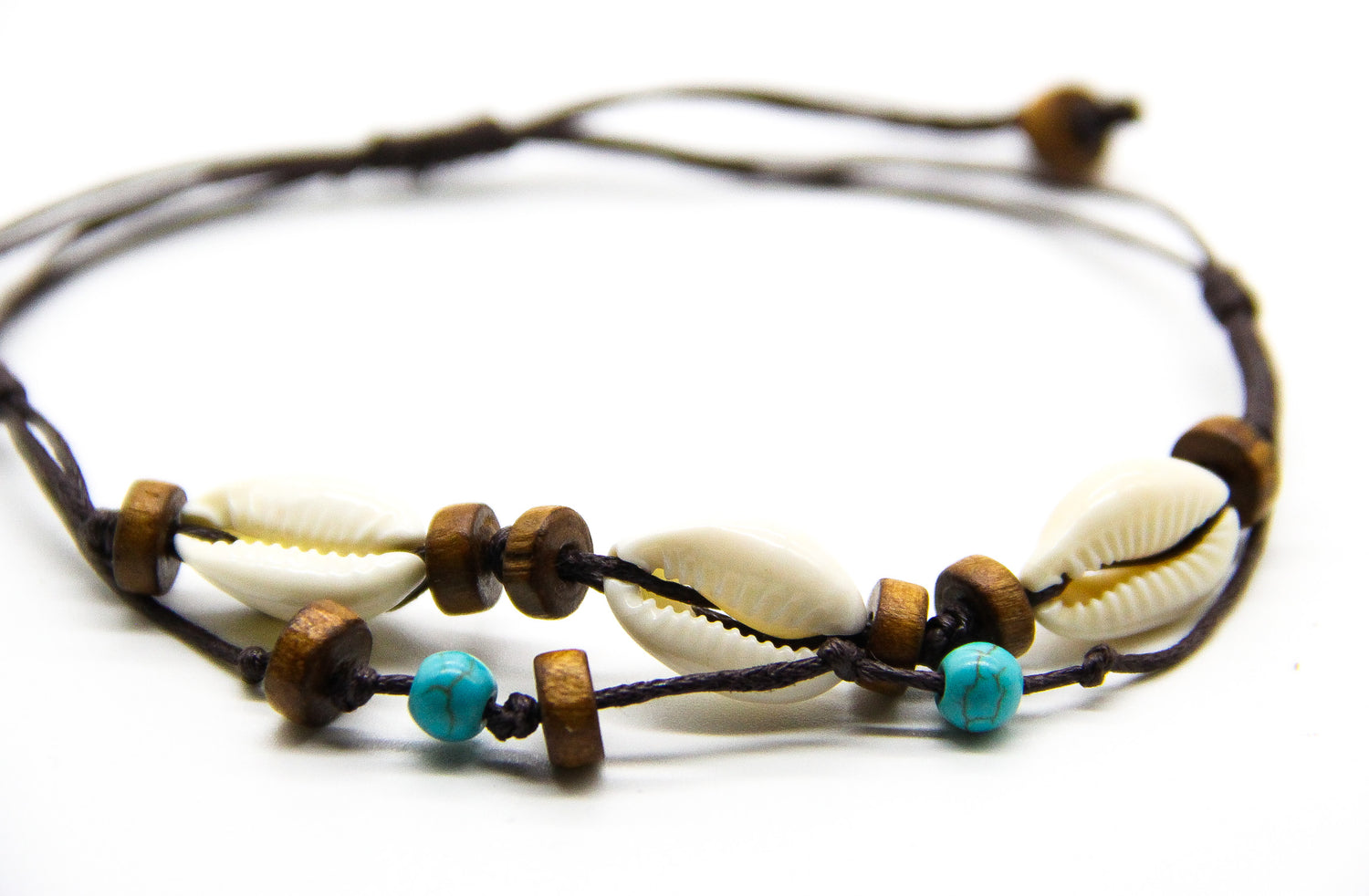 layered beach anklet with wooden beads and shells