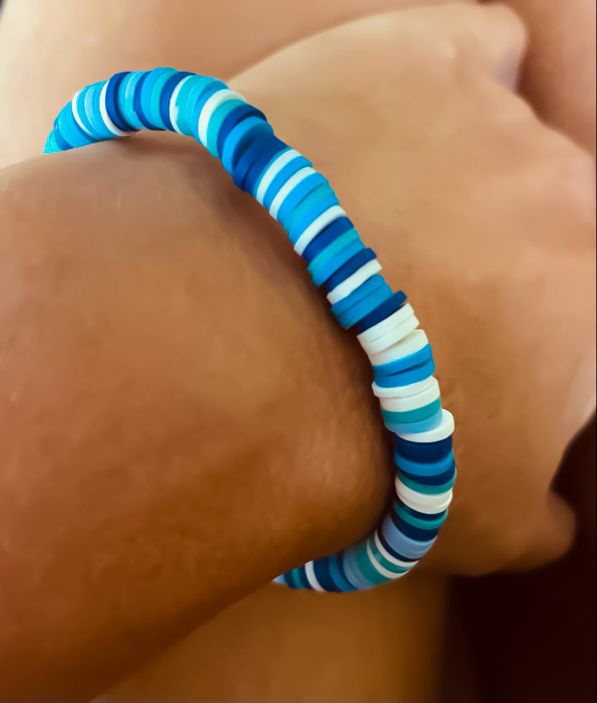 Model wearing colourful blue and white bracelet - Beach Jewellery - Ben's Beach UK