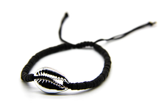 Black braided beach-style bracelet with silver seashell pendant