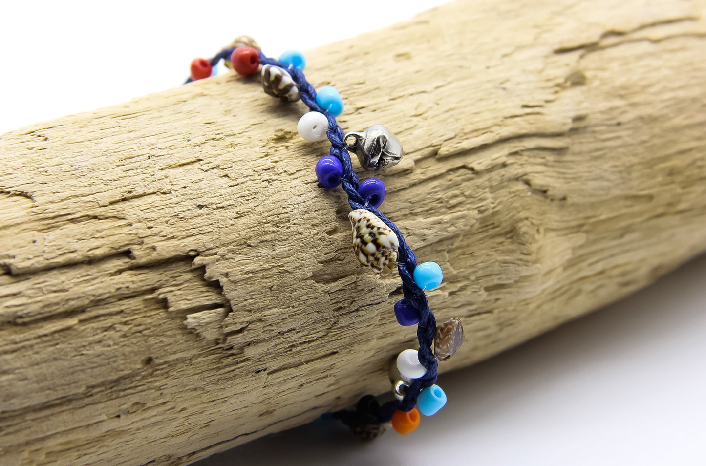 navy blue string anklet with colourful beads, tiny shells and silver bells 