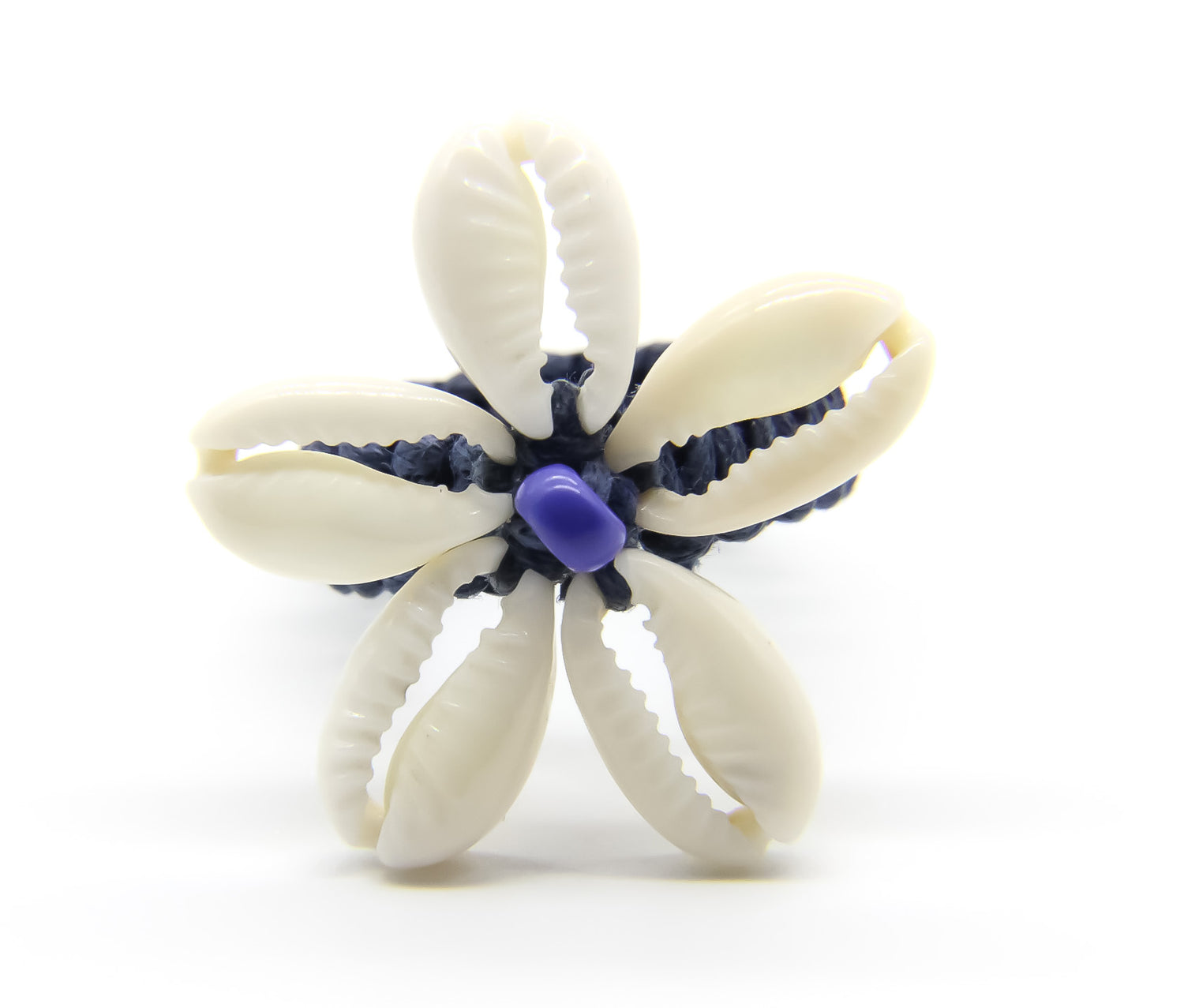 ring with sea shells in the shape of a flower