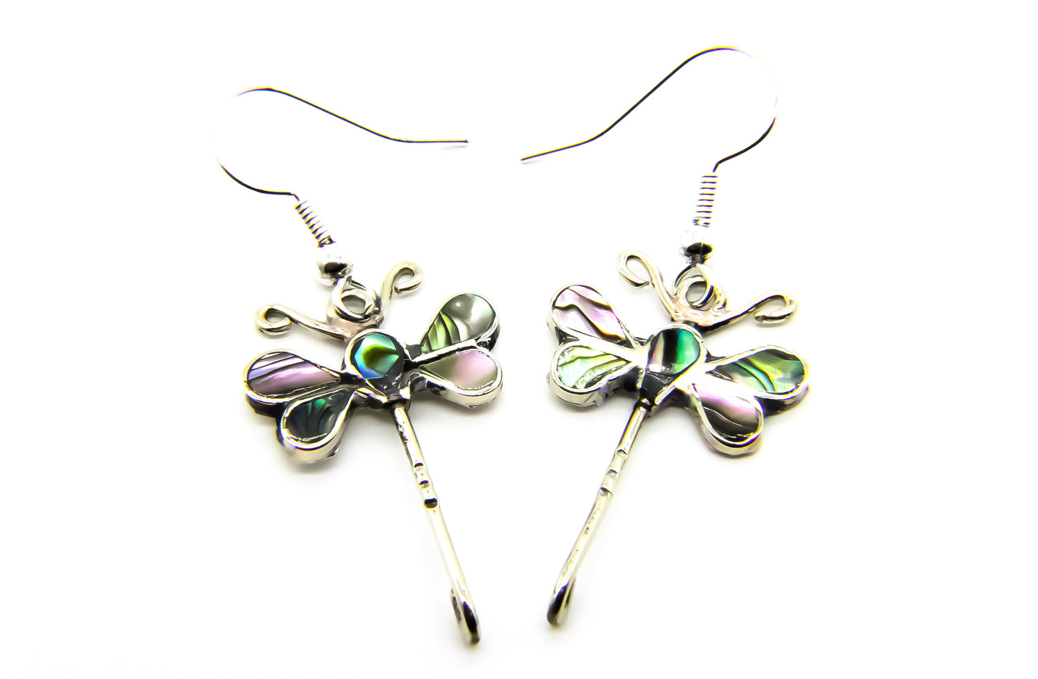 Silver earrings in the shape of dragonflies inlaid with iridescent shell. 