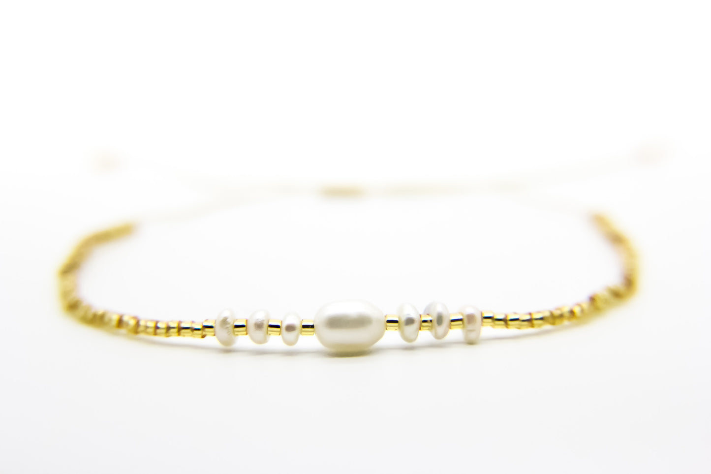 gold seed bead bracelet with pearl