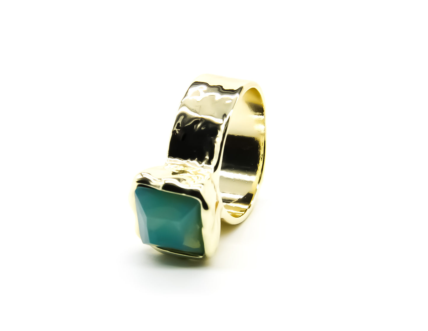 silver view of a chunky gold ring with square green stone
