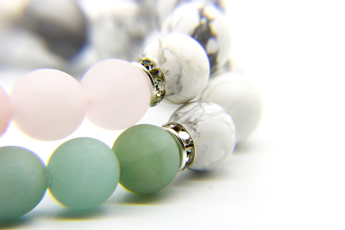 Stone Bracelets with green, pink and white stone beads. Small silver and crystal detail. 