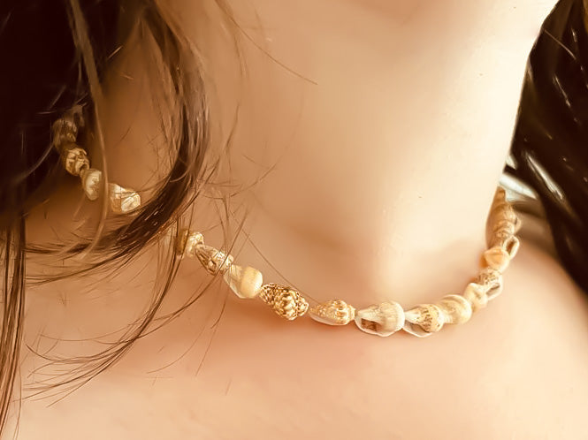 Model wearing seashell necklace - beach style jewellery