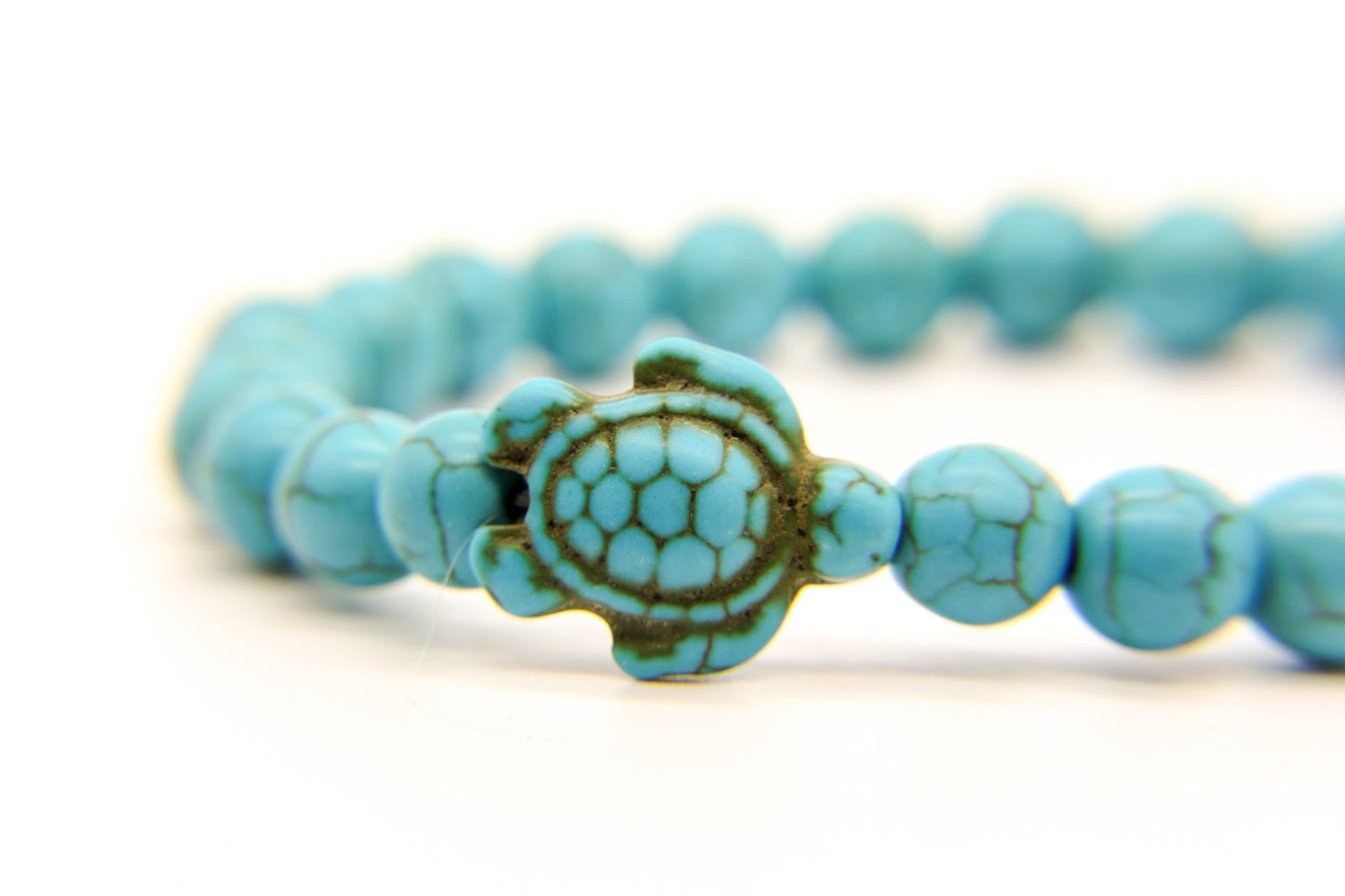 Turquoise beaded beach bracelet with sea turtle pendant