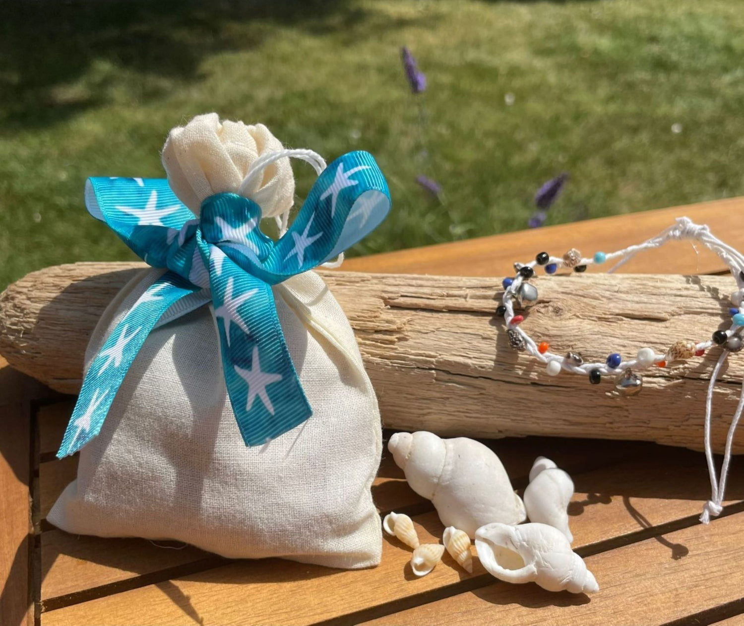 filled party bag with white beach anklet