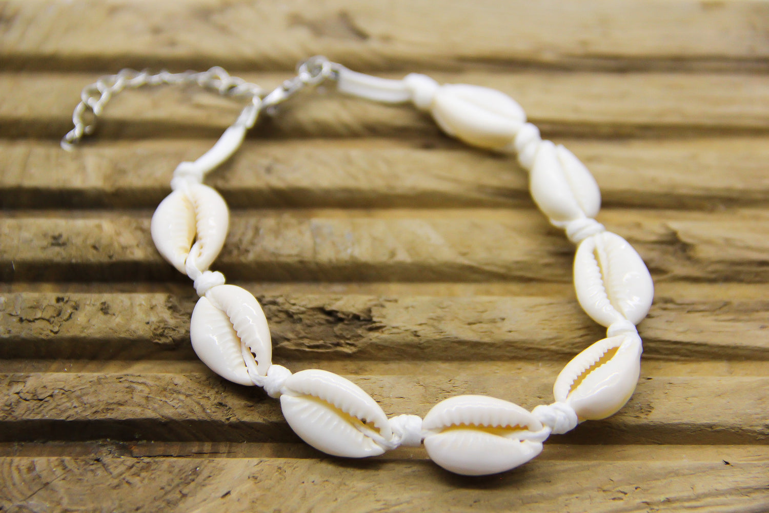 white cowrie shell anklet